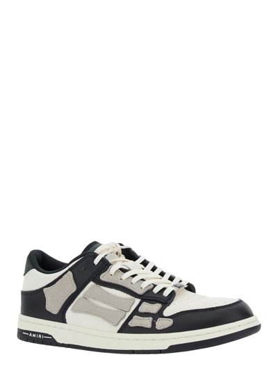 Shop Amiri Black And White Low Top Sneakers With Panels In Leather Man In White/black