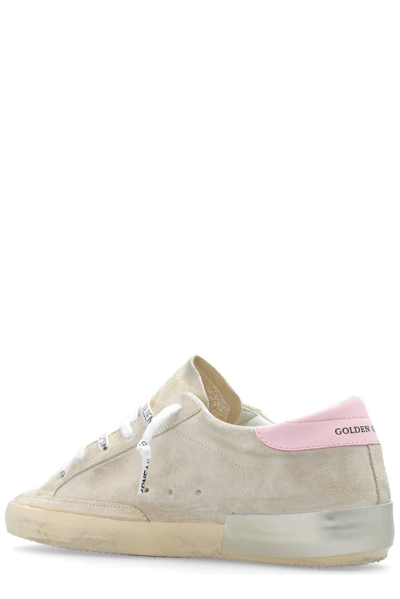Shop Golden Goose Super-star Distressed Lace-up Sneakers In Beige