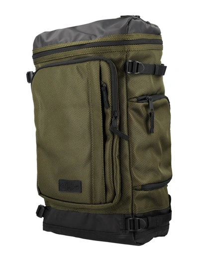 Shop Eastpak Tecum Top Cnnct Coat Backpack In Army