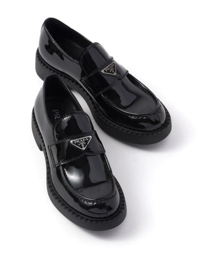 Shop Prada Patent Leather Loafers In Nero