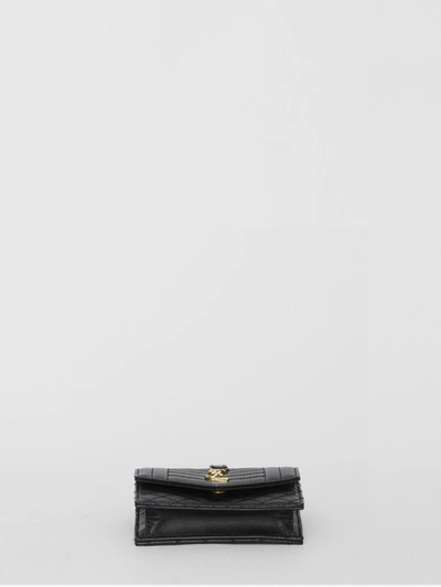 Shop Saint Laurent Quilted Leather Wallet In Black
