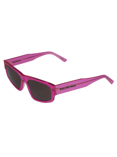 Shop Balenciaga Logo Sided Rectangular Lens Sunglasses In Fuchsia/grey