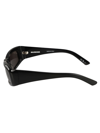 Shop Balenciaga Logo Detail Rectangular Lens Sunglasses In Black/grey