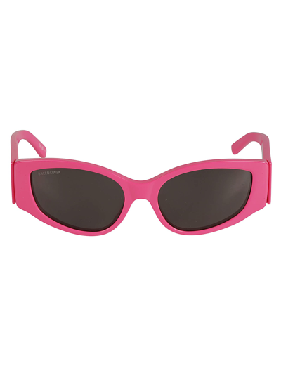 Shop Balenciaga Logo Sided Cat-eye Sunglasses In Fuchsia/grey