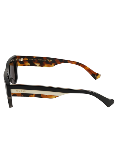 Shop Gucci Flame Effect Classic Sunglasses In Black/brown