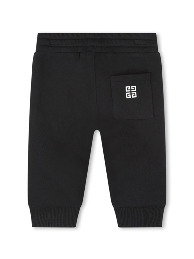 Shop Givenchy Printed Sports Trousers In Black