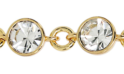 Shop Kurt Geiger Micro Eagle Crystal Linear Drop Earrings In Crystal/ Yellow Gold