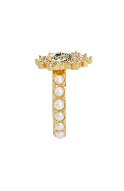 Shop Kurt Geiger Crystal Evil Eye Cocktail Ring In Pearl/ Yellow Gold