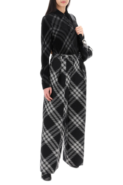 Shop Burberry Double Pleated Checkered Palazzo Pants In Black,white