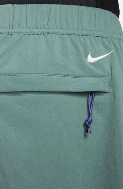 Shop Nike Acg Water Repellent Stretch Nylon Hiking Shorts In Bicoastal/ Vintage Green