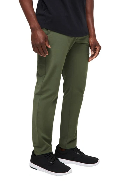 Shop Travis Mathew Open To Close Chinos In Thyme
