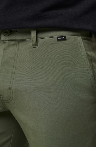 Shop Travis Mathew Open To Close Chinos In Thyme