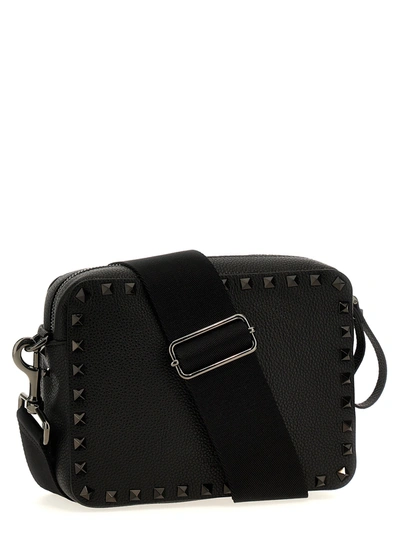 Shop Valentino Rockstud Crossbody Bags Black