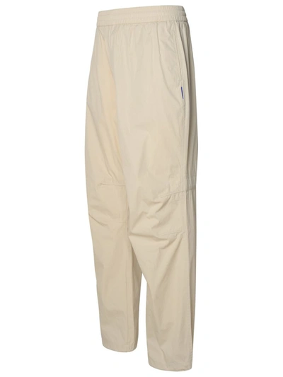 Shop Burberry Beige Cotton Blend Trousers In Cream