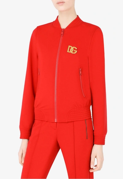 Shop Dolce & Gabbana Dg Embellished Jersey Bomber Jacket In Red