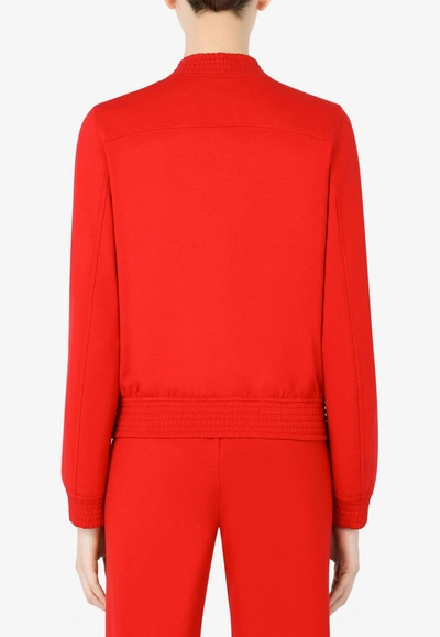 Shop Dolce & Gabbana Dg Embellished Jersey Bomber Jacket In Red