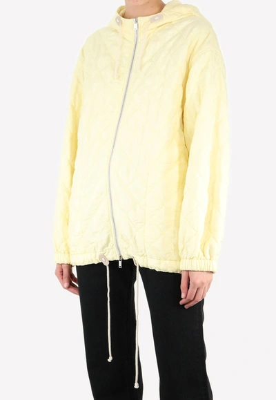 Jil Sander Diamond-quilt Hooded Jacket In Yellow