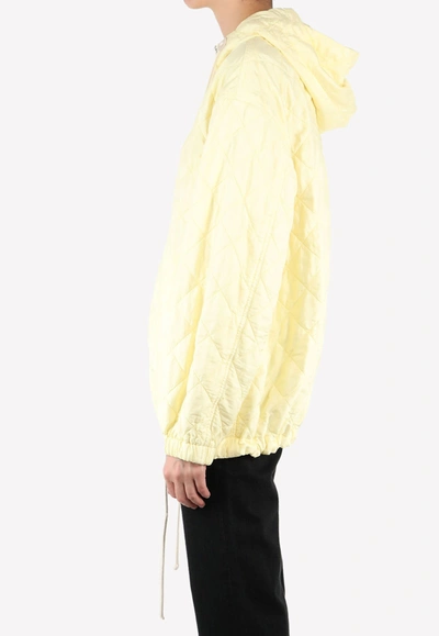 Jil Sander Diamond-quilt Hooded Jacket In Yellow