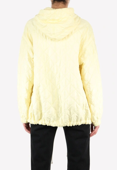 Jil Sander Diamond-quilt Hooded Jacket In Yellow