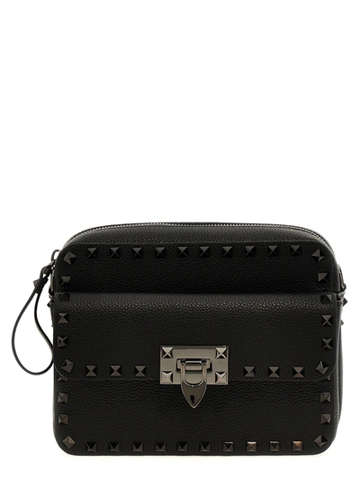 Shop Valentino Rockstud Crossbody Bags In Black