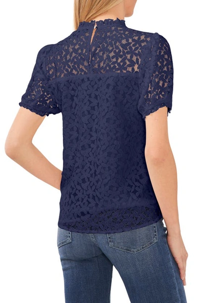 Shop Cece Puff Sleeve Floral Lace Blouse In Classic Navy