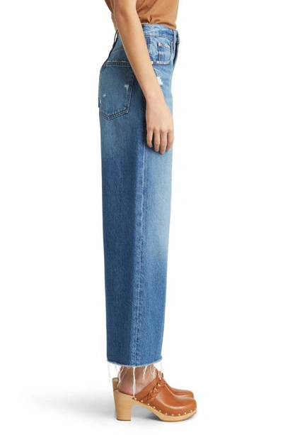Shop Frame The Relaxed Raw Hem Straight Leg Jeans In Mariner