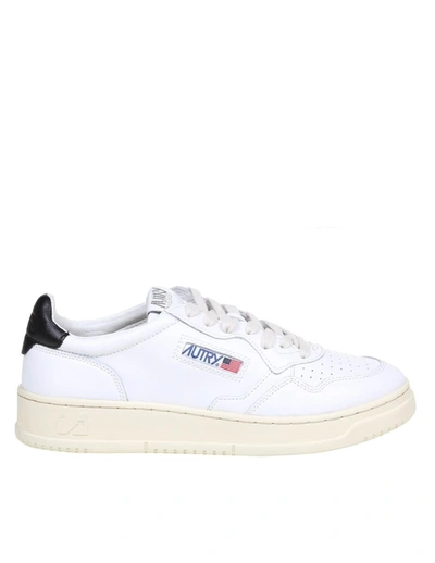 Shop Autry Leather Sneakers In White/black