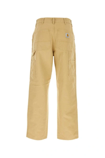 Shop Carhartt Wip Pants In Yellow