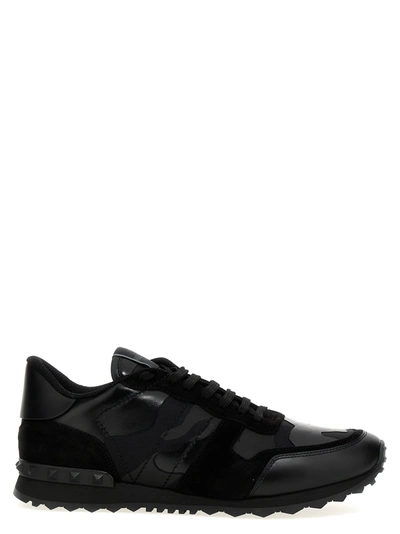 Shop Valentino Garavani Rockrunner Sneakers Black