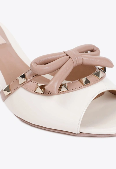 Shop Valentino 60 Rockstud Leather Mules In Ivory