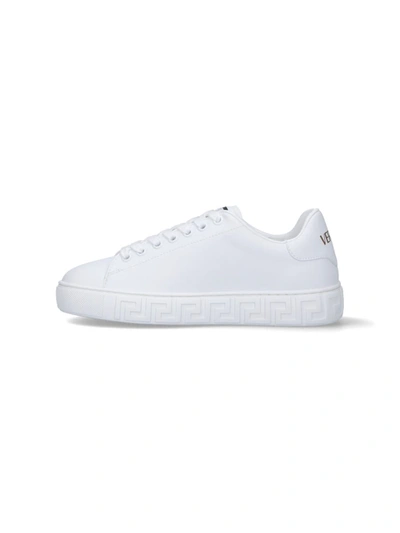 Shop Versace Sneakers In White