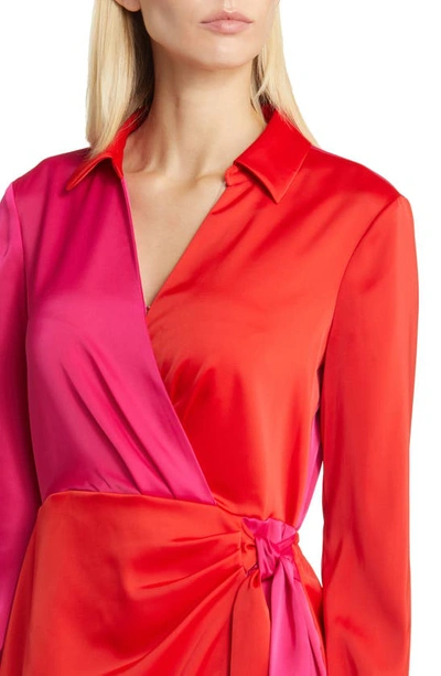 Shop Anne Klein Colorblock Long Sleeve Satin Faux Wrap Dress In Poppy/ Amaranth