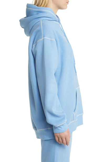 Shop The Mayfair Group Empathy Cotton Blend Hoodie In Soft Blue
