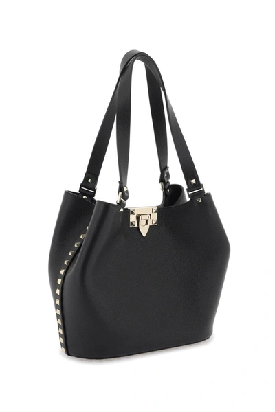 Shop Valentino Garavani Small Rockstud Tote Bag In Black
