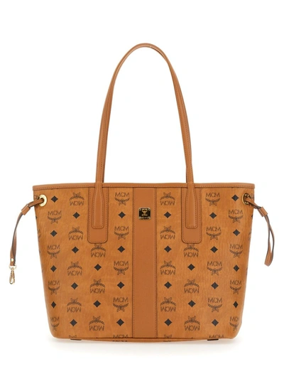 Shop Mcm Shopper Piccola In Tela Monogram In Brown