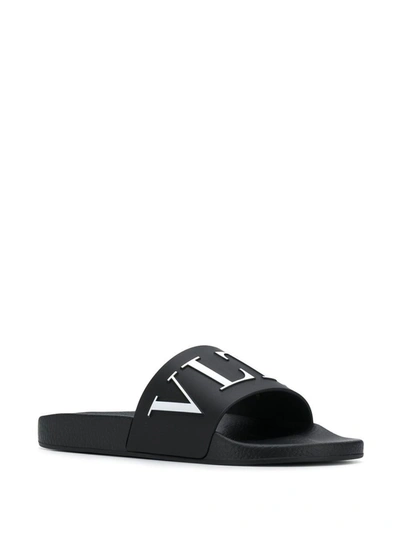 Shop Valentino Garavani Vltn Pool Slides In Black