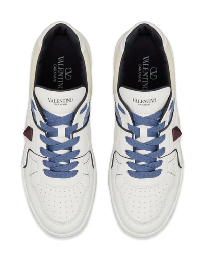 Shop Valentino Garavani Sneakers & Slip-on In White