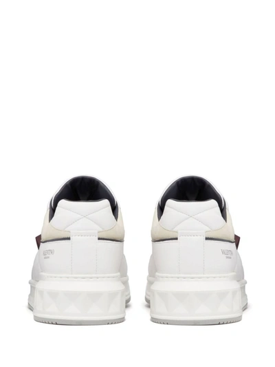 Shop Valentino Garavani Sneakers & Slip-on In White