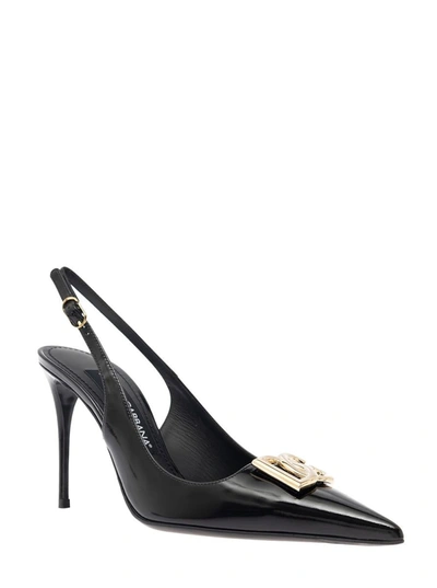 Shop Dolce & Gabbana Black Slingback Pumps With Metal Dg Patch In Shiny Leather Woman