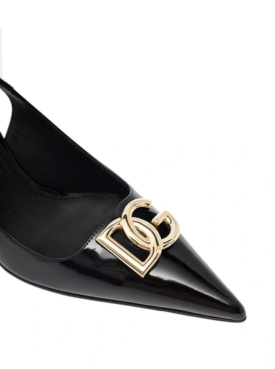 Shop Dolce & Gabbana Black Slingback Pumps With Metal Dg Patch In Shiny Leather Woman