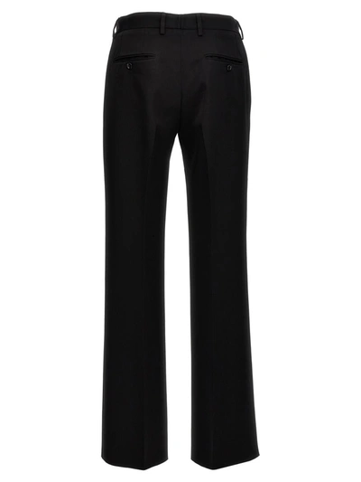 Shop Dolce & Gabbana Flare Pants In Black