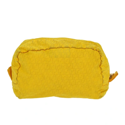Shop Fendi Zucchino Yellow Canvas Clutch Bag ()