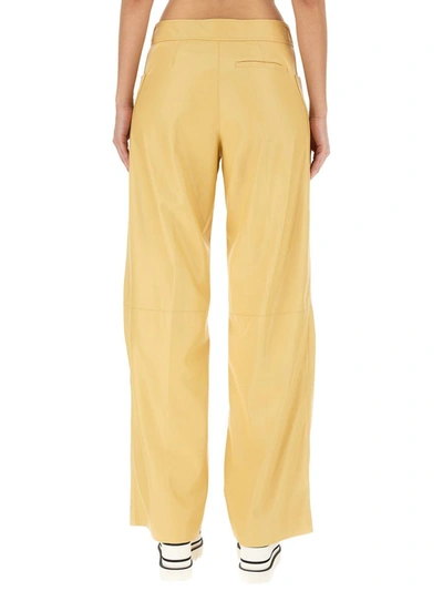 Shop Stella Mccartney Pants In Alter Mat In Yellow