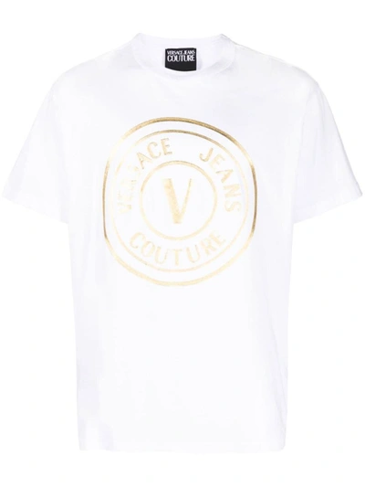 Shop Versace Jeans Couture R Vemblem Tick Foil  T-shirt Clothing In G03 White/gold