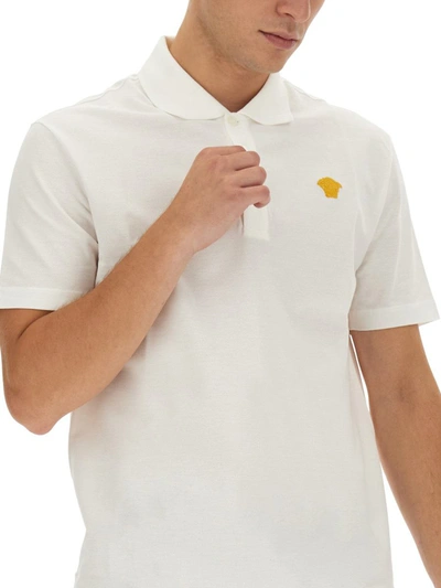 Shop Versace Polo With Logo In White