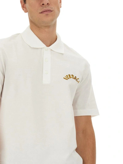 Shop Versace Polo With Logo Embroidery In White