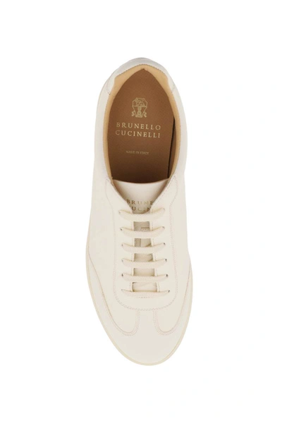 Shop Brunello Cucinelli Hammered Leather Sneakers In White