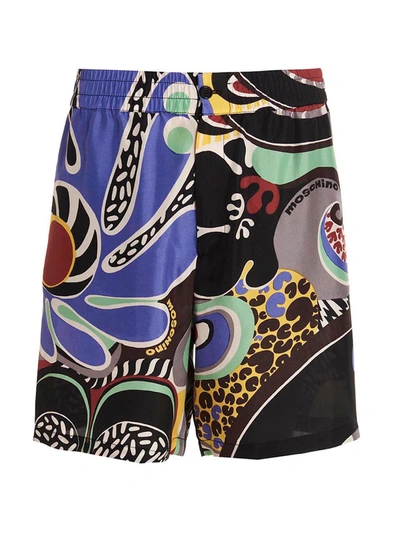 Shop Moschino 'psychedelic' Bermuda Shorts