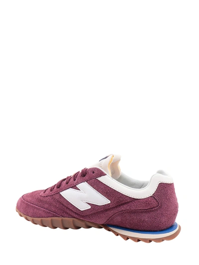 Shop New Balance Suede Sneakers