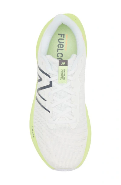 Shop New Balance Fuelcell Propel V4 Running Shoe In White/ Bleached Lime Glow